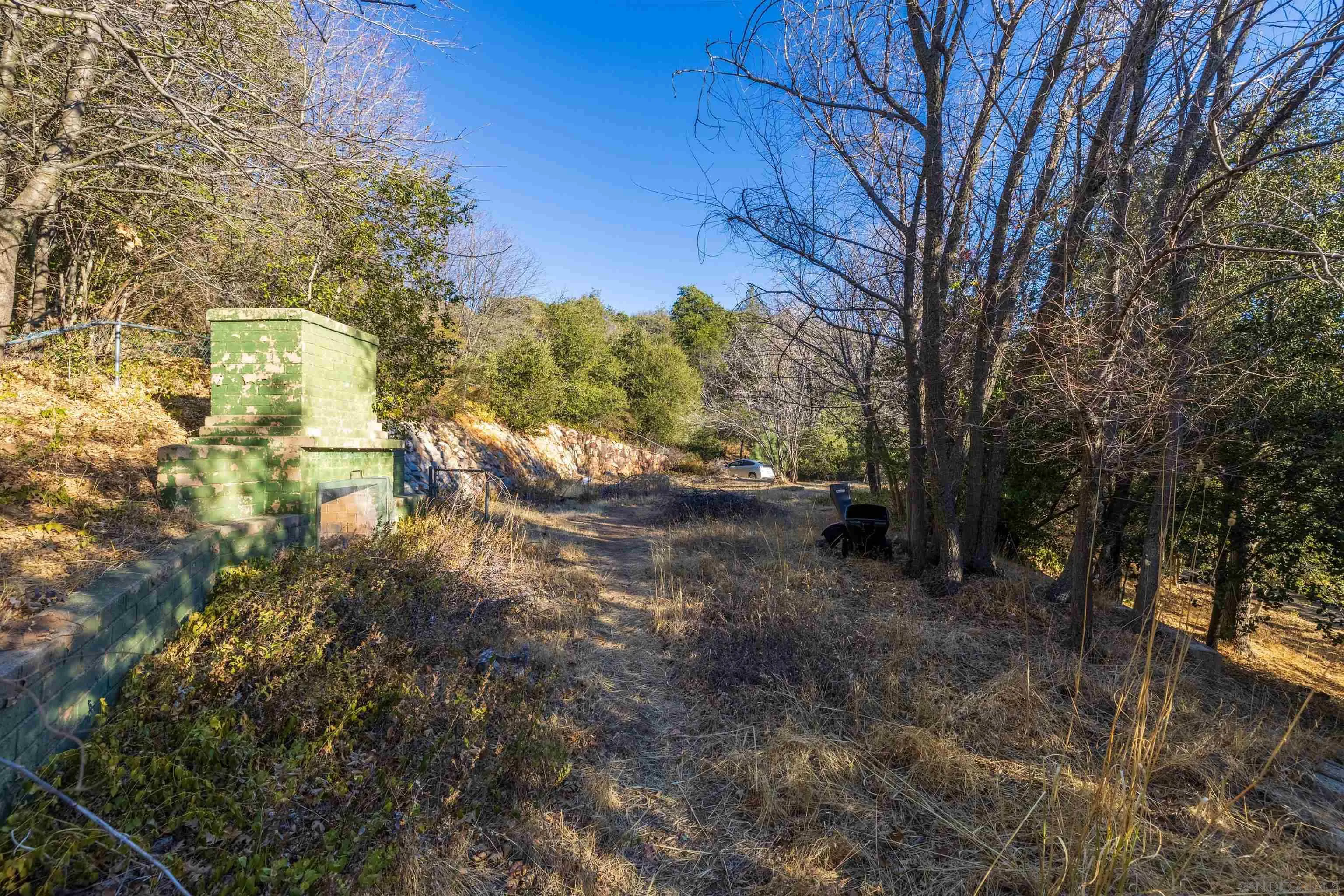 5298 Pine Hills Road, Unit 1 Julian, CA 92036 - Photo 6 of 21 a view of a trees with a yard