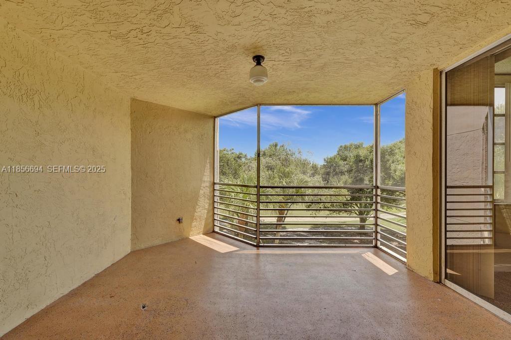 9520 Seagrape Drive, Unit 306 Davie, FL 33324 - Photo 3 of 20 a view of a room with stairs