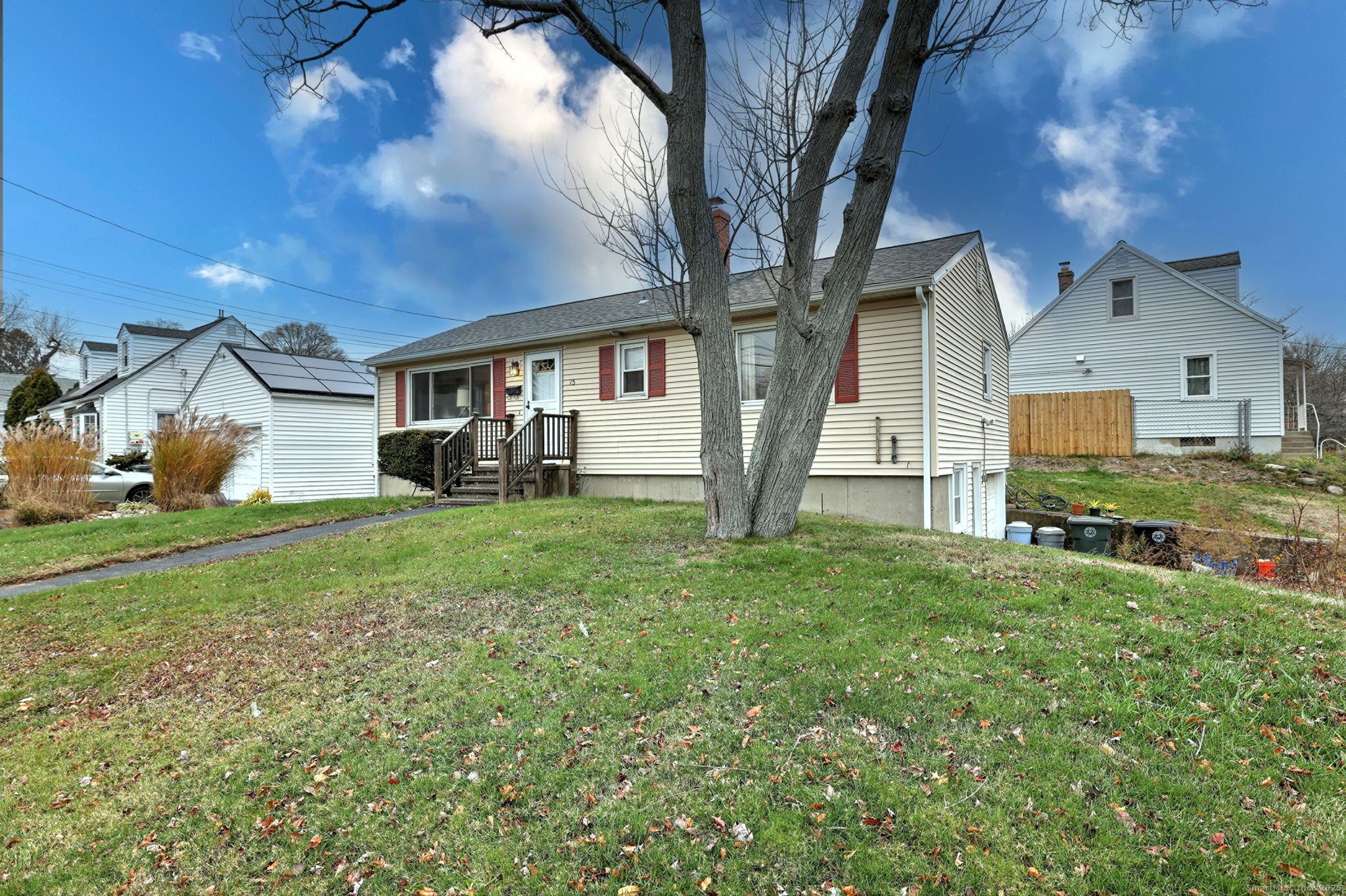 15 Utica Street Milford, CT 06461 - Photo 37 of 39 a view of a house with backyard and a tree