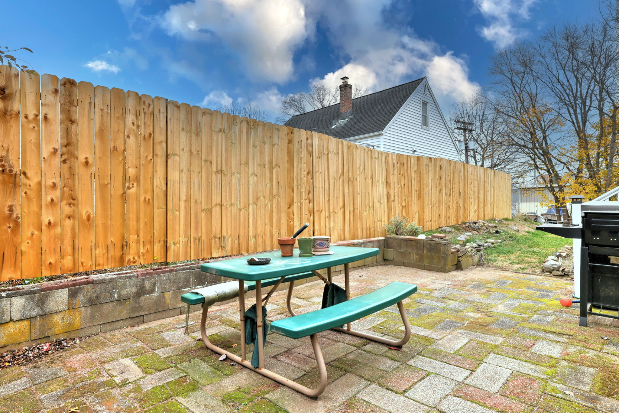 15 Utica Street Milford, CT 06461 - Photo 6 of 39 a view of a chairs and table in the patio