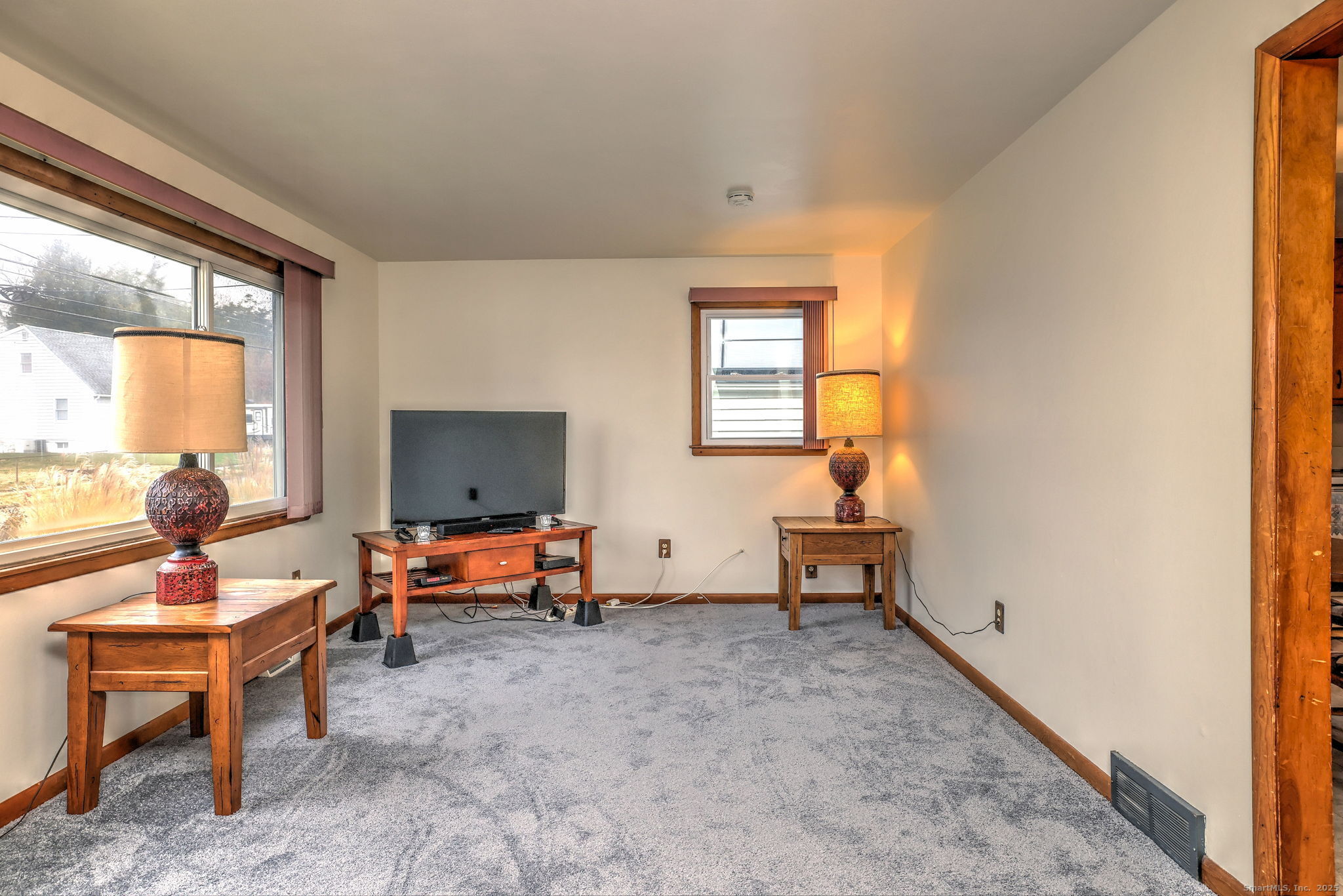 15 Utica Street Milford, CT 06461 - Photo 8 of 39 a living room with furniture and a window