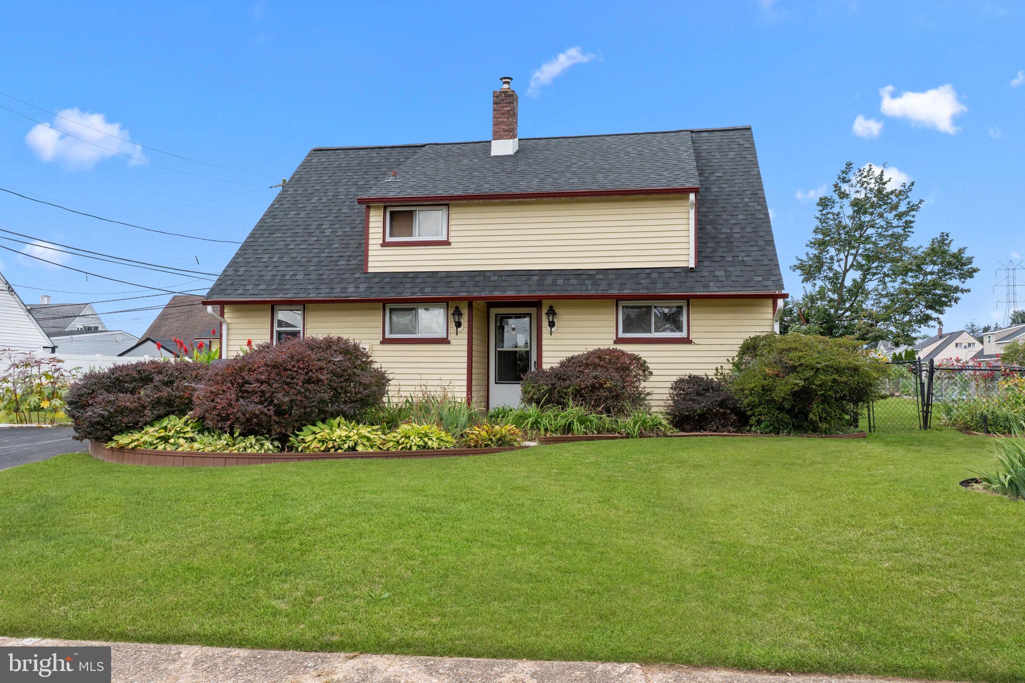 67 Greenbriar Road Levittown, PA 19057 - Photo 1 of 24 a front view of a house with a yard