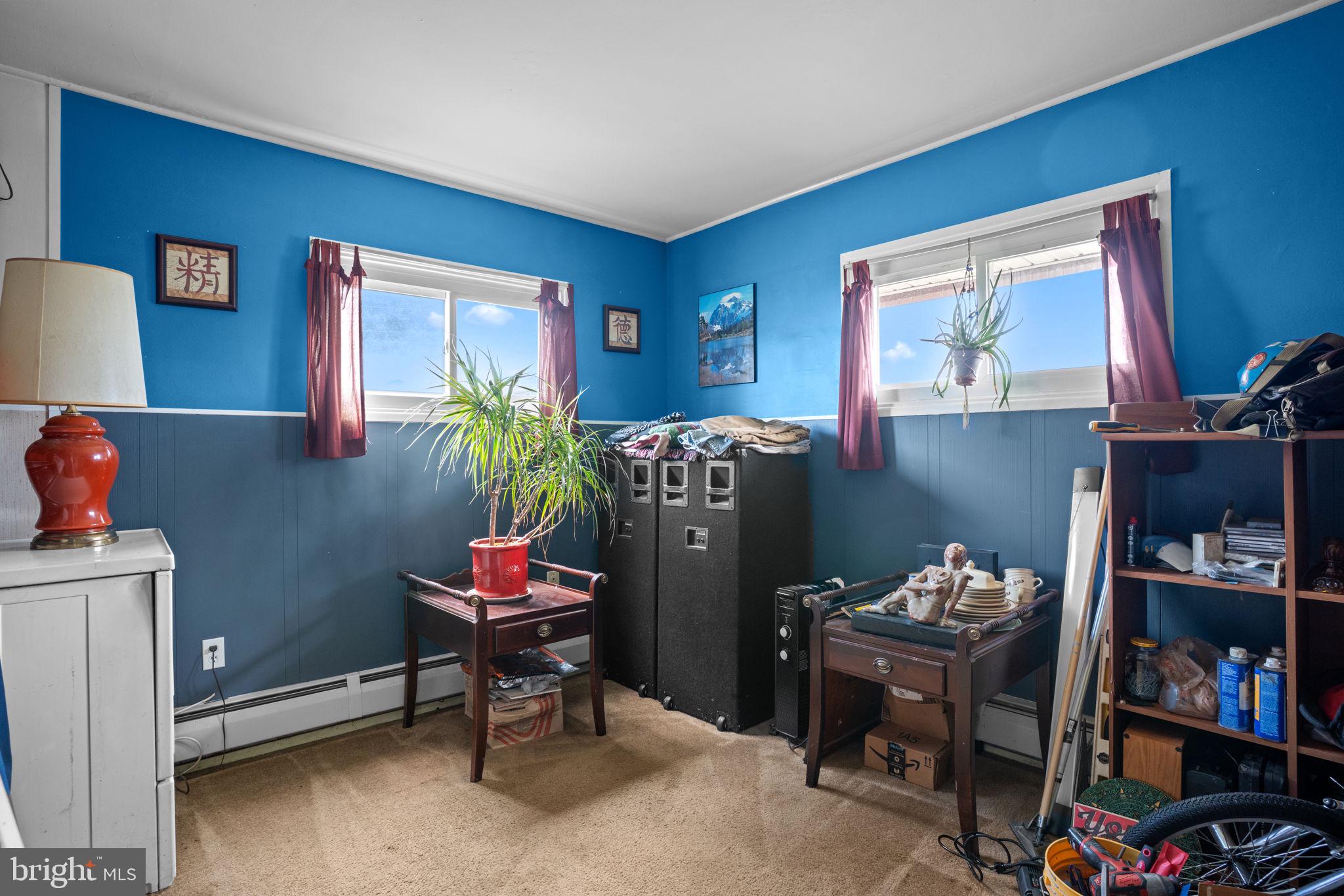 67 Greenbriar Road Levittown, PA 19057 - Photo 12 of 24 a living room with furniture and a window