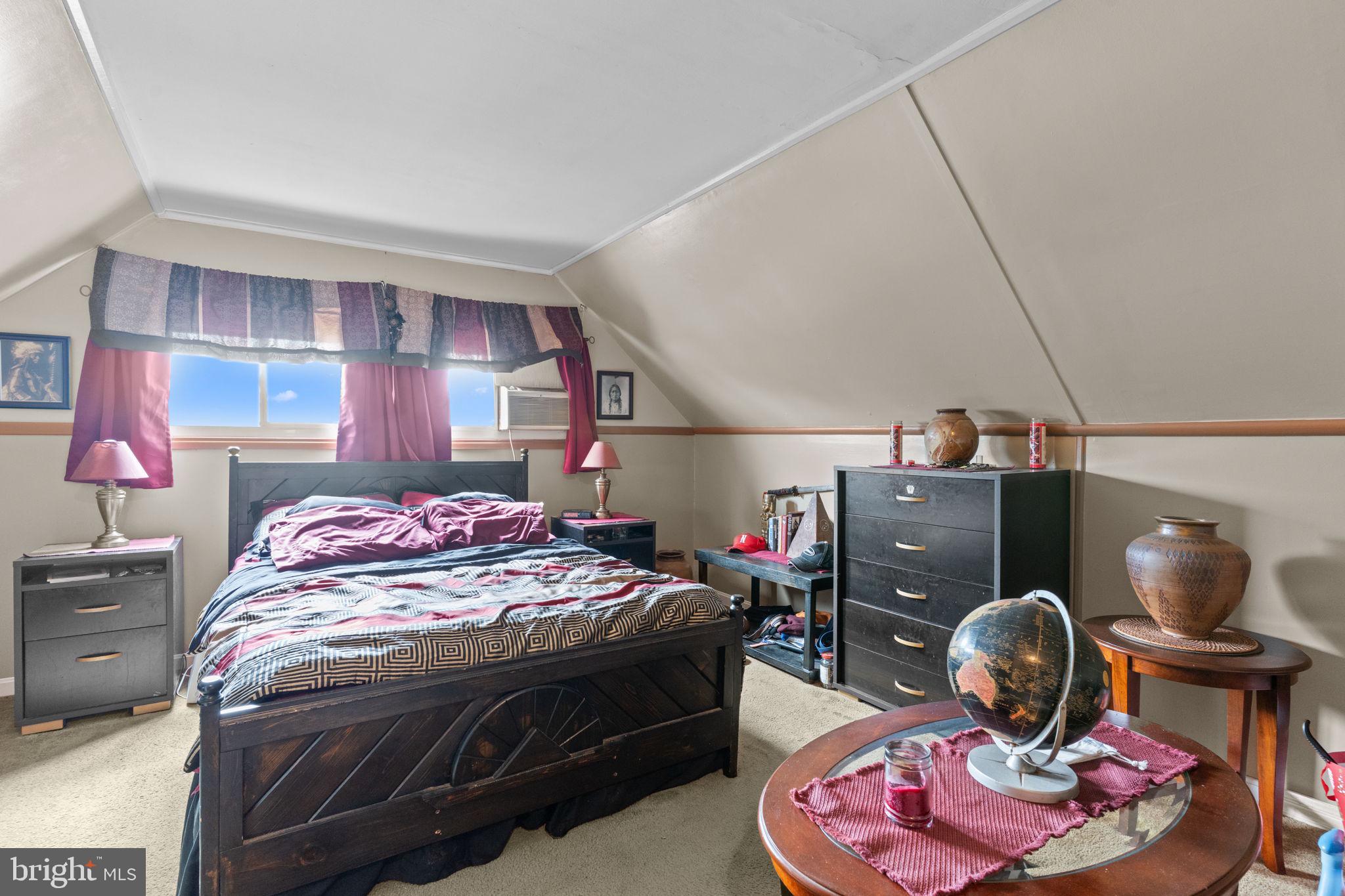 67 Greenbriar Road Levittown, PA 19057 - Photo 15 of 24 a bedroom with a bed and a chair