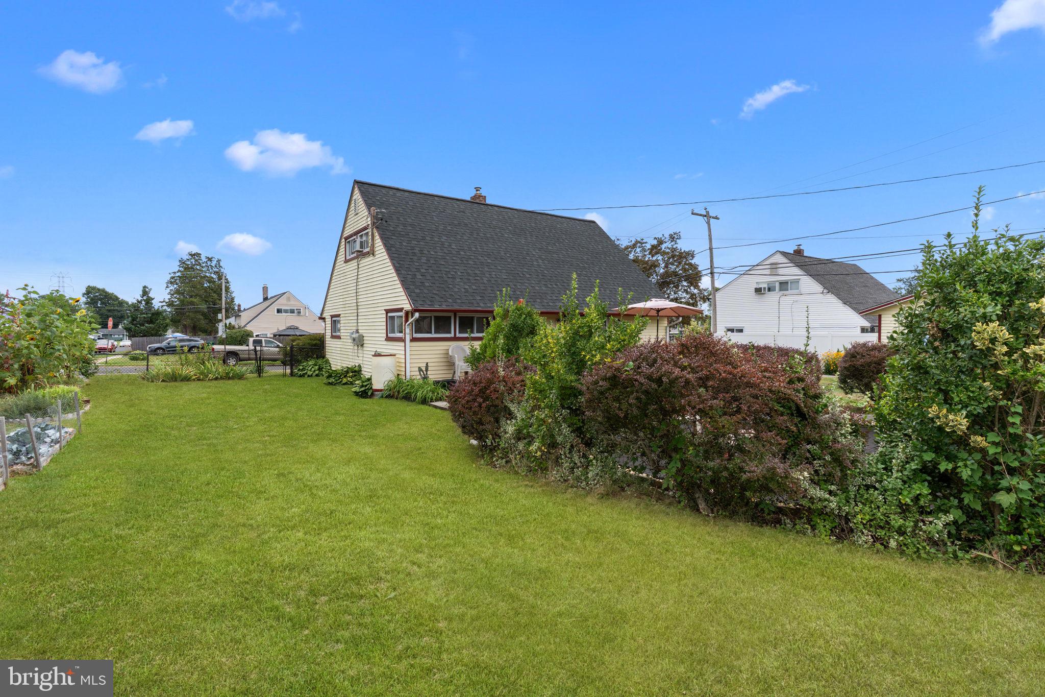 67 Greenbriar Road Levittown, PA 19057 - Photo 21 of 24 a view of a back yard of the house
