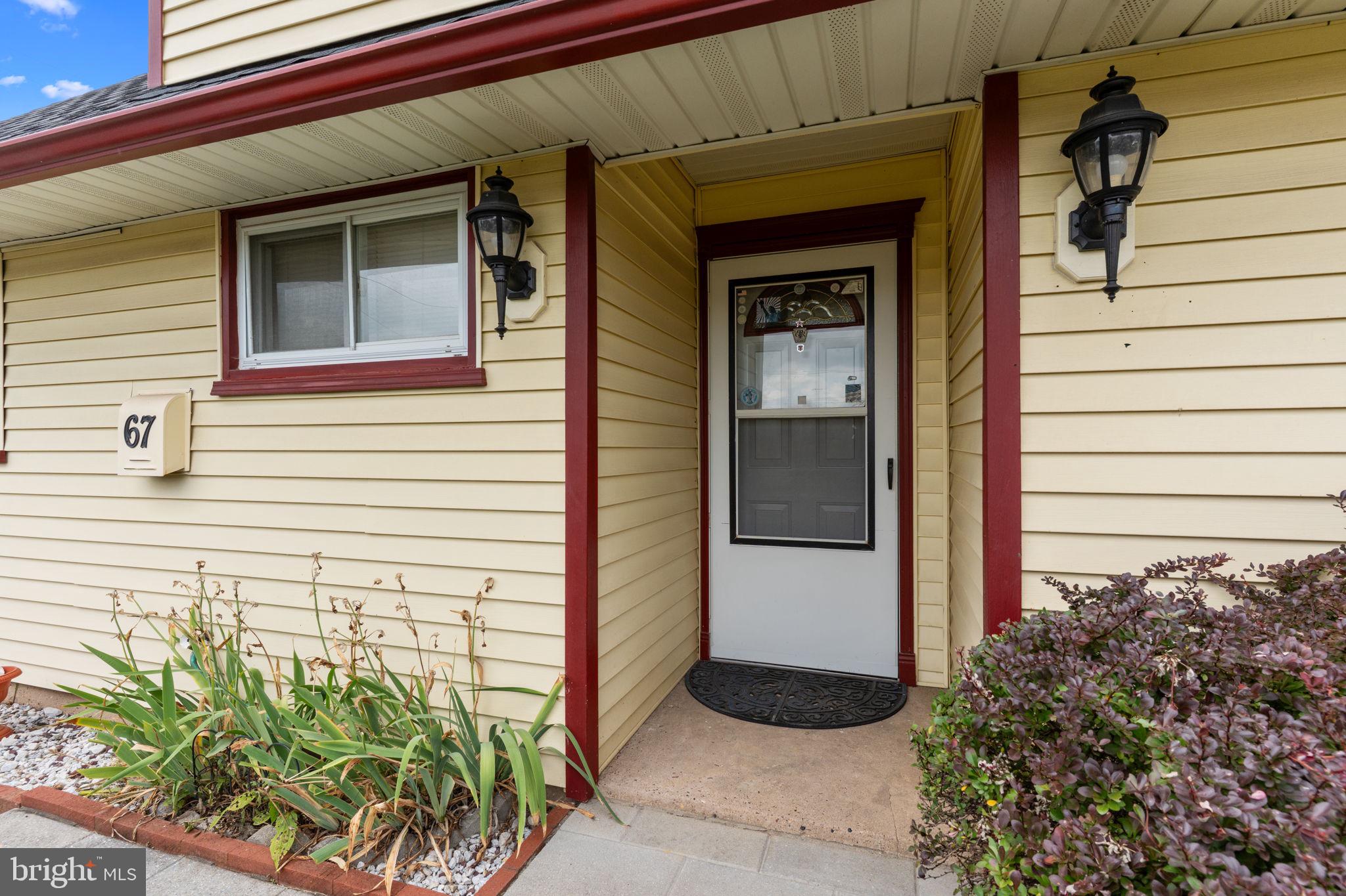 67 Greenbriar Road Levittown, PA 19057 - Photo 3 of 24 a view of a door of the house