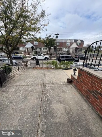a view of a terrace with sitting area