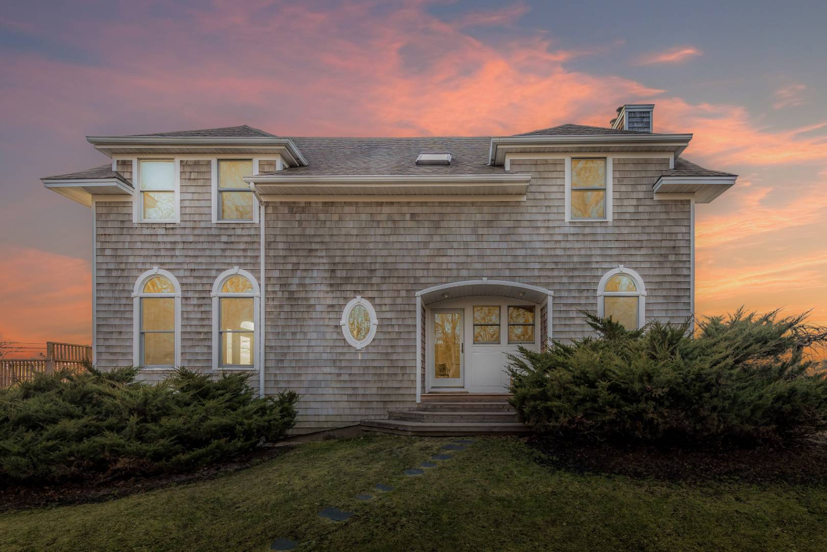 56 South Country Road Westhampton, NY 11977 - Photo 1 of 15 a front view of a house with garden