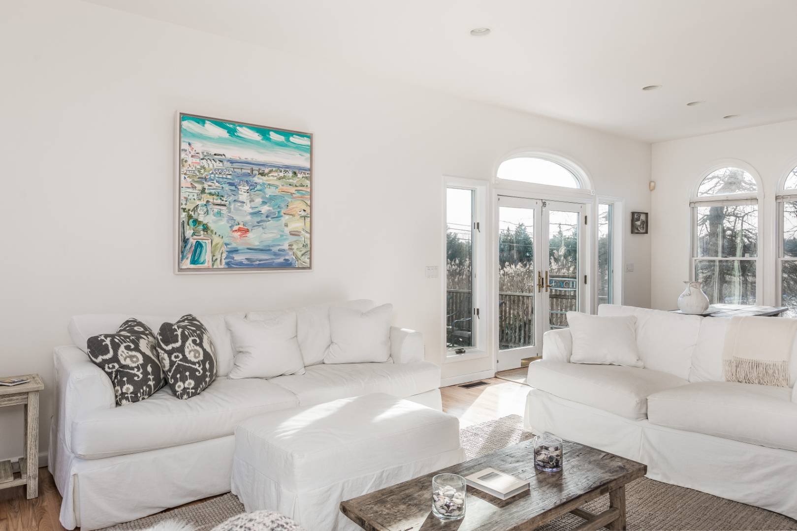 56 South Country Road Westhampton, NY 11977 - Photo 2 of 15 a living room with furniture and a large window