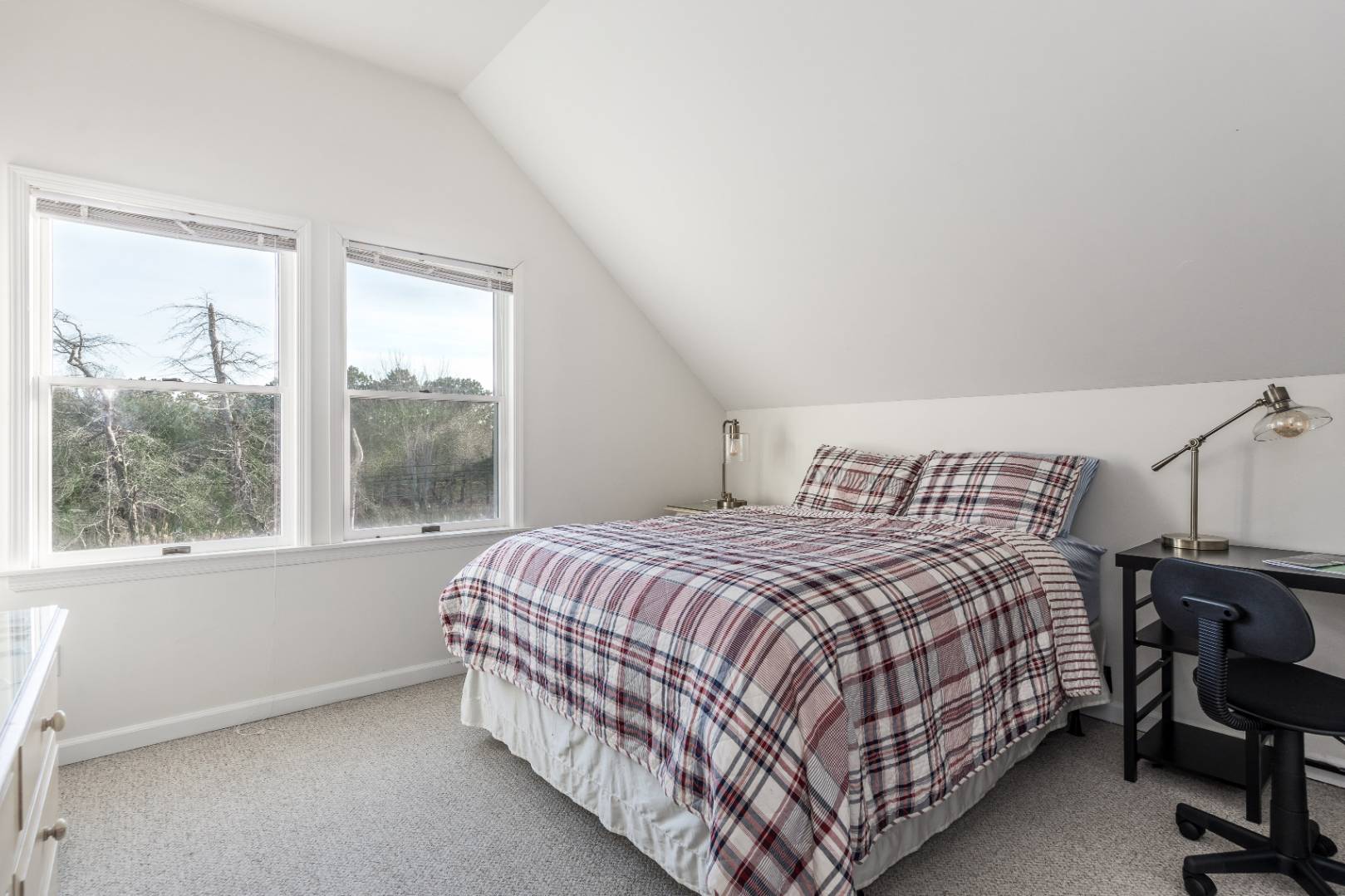 56 South Country Road Westhampton, NY 11977 - Photo 11 of 15 a bedroom with a bed lamp and a window