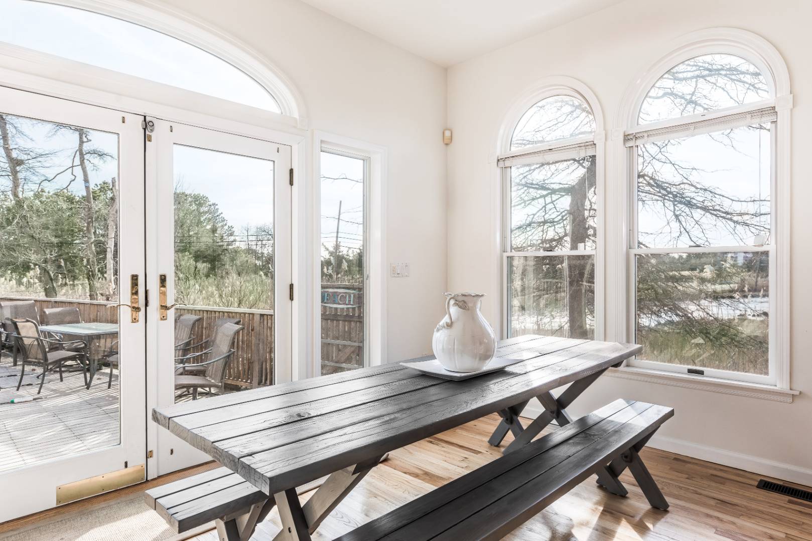 56 South Country Road Westhampton, NY 11977 - Photo 3 of 15 a living room with furniture and a window