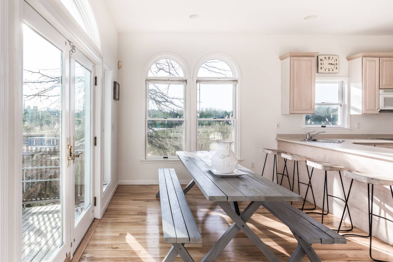56 South Country Road Westhampton, NY 11977 - Photo 7 of 15 a view of a dining room with furniture window and outside view
