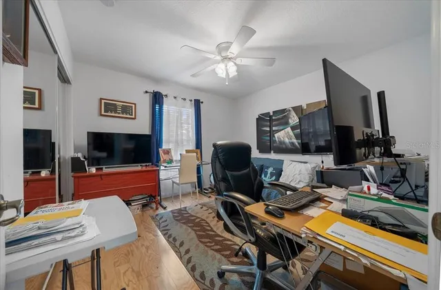 a view of a workspace with furniture