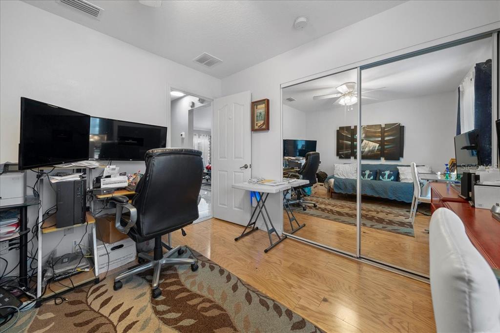 4997 Southwest 107th Loop Ocala, FL 34476 - Photo 27 of 48 a view of a workspace with furniture