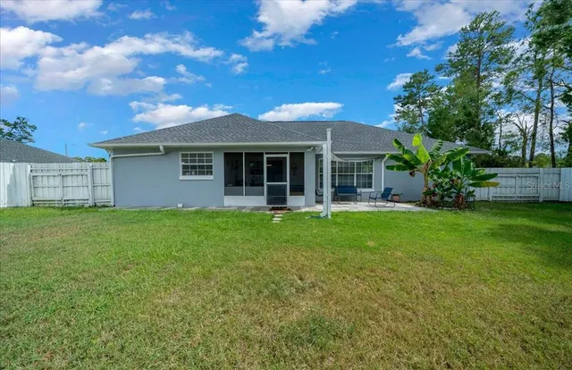 a front view of house with yard and porch