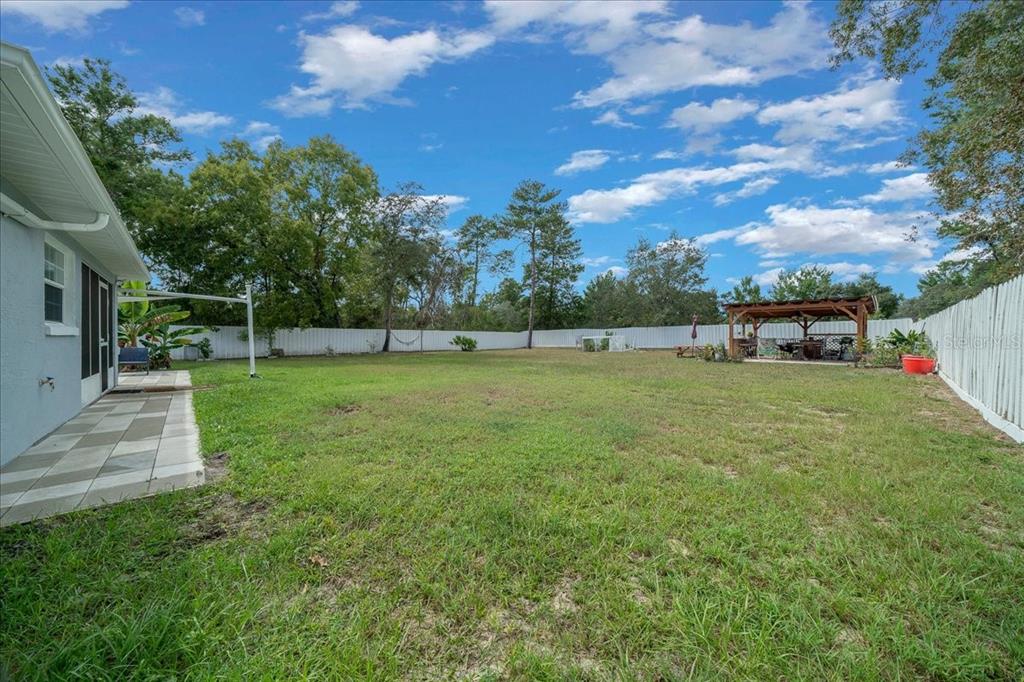 4997 Southwest 107th Loop Ocala, FL 34476 - Photo 42 of 48 a view of a park with large trees