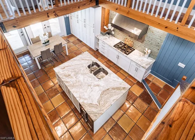 a view of kitchen with cabinets