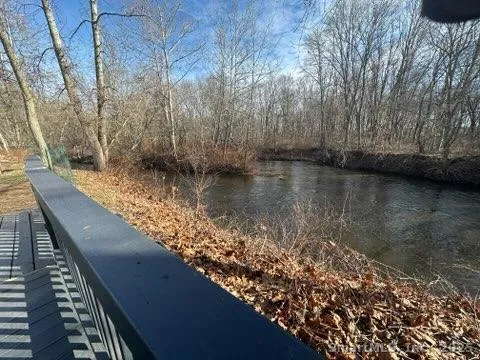 a view of a lake from a balcony