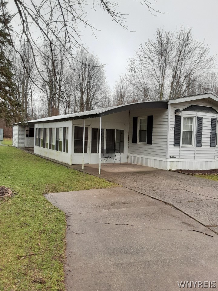 23 Willow Road Gaines, NY 14411 - Photo 1 of 1 Front left side with enclosed sun porch, 2 patio