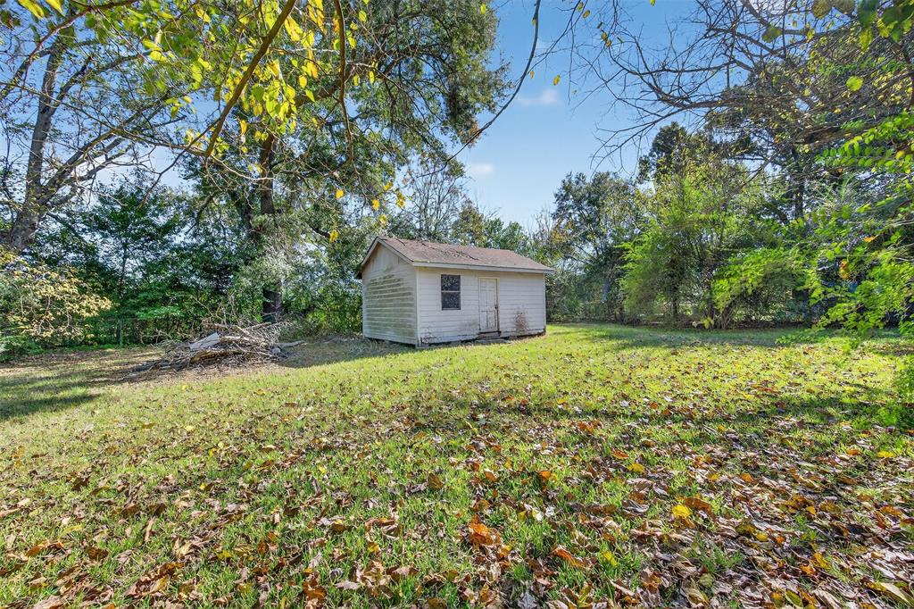 113 Linden Drive Athens, TX 75751 - Photo 14 of 19 a backyard of a house with lots of green space