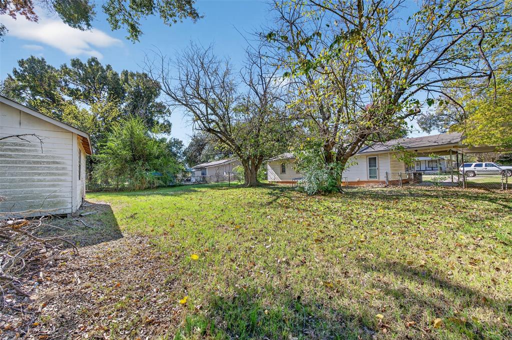 113 Linden Drive Athens, TX 75751 - Photo 15 of 19 a front view of a house with garden