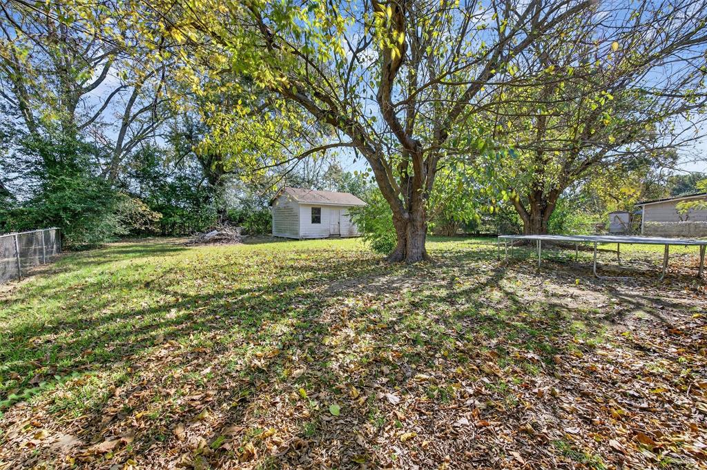 113 Linden Drive Athens, TX 75751 - Photo 19 of 19 a house with trees in front of it