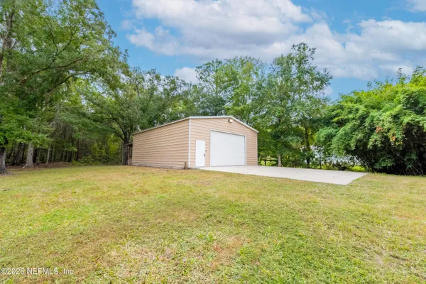a view of an outdoor space and a yard