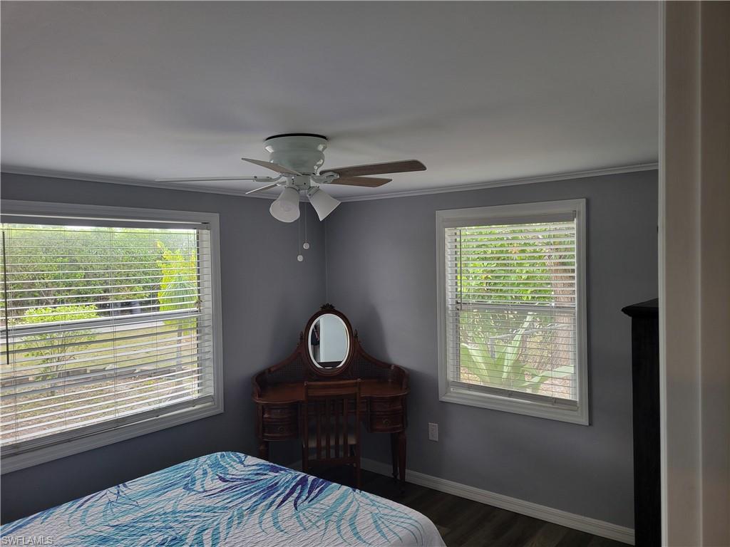 2662 Mangrove Street Naples, FL 34112 - Photo 29 of 31 a bedroom with a bed and a window