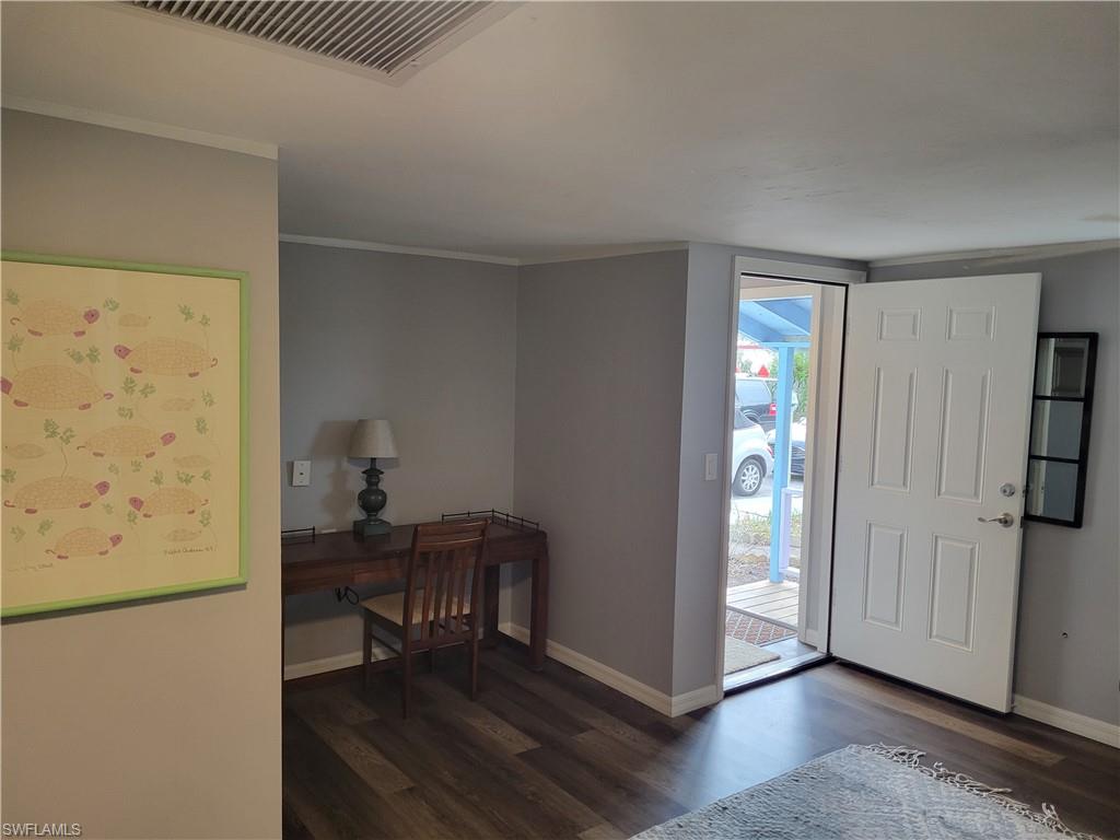 2662 Mangrove Street Naples, FL 34112 - Photo 30 of 31 a view of workspace with furniture and wooden floor