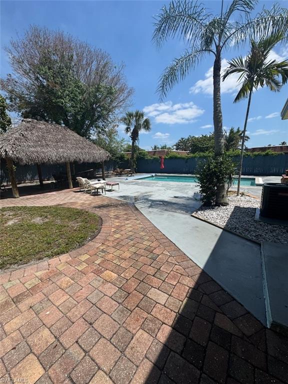 2662 Mangrove Street Naples, FL 34112 - Photo 7 of 31 a view of a yard and patio