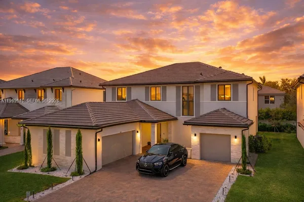 a car parked in front of a house