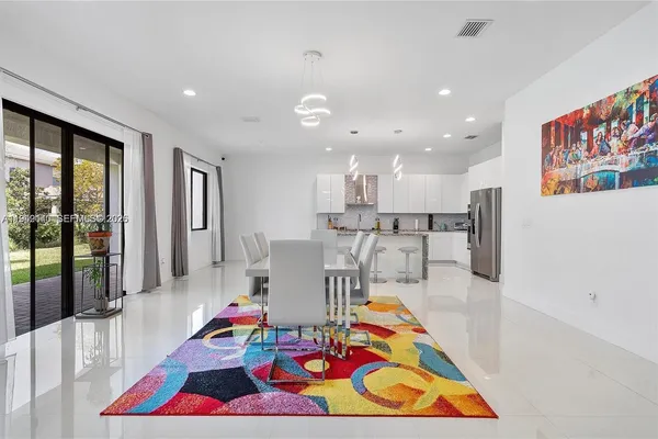 a room with furniture and rug floor