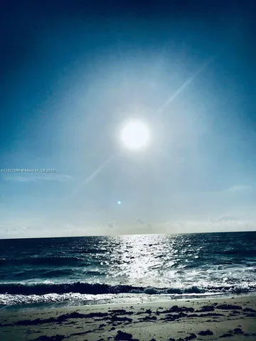 a view of water heater and trees in the background