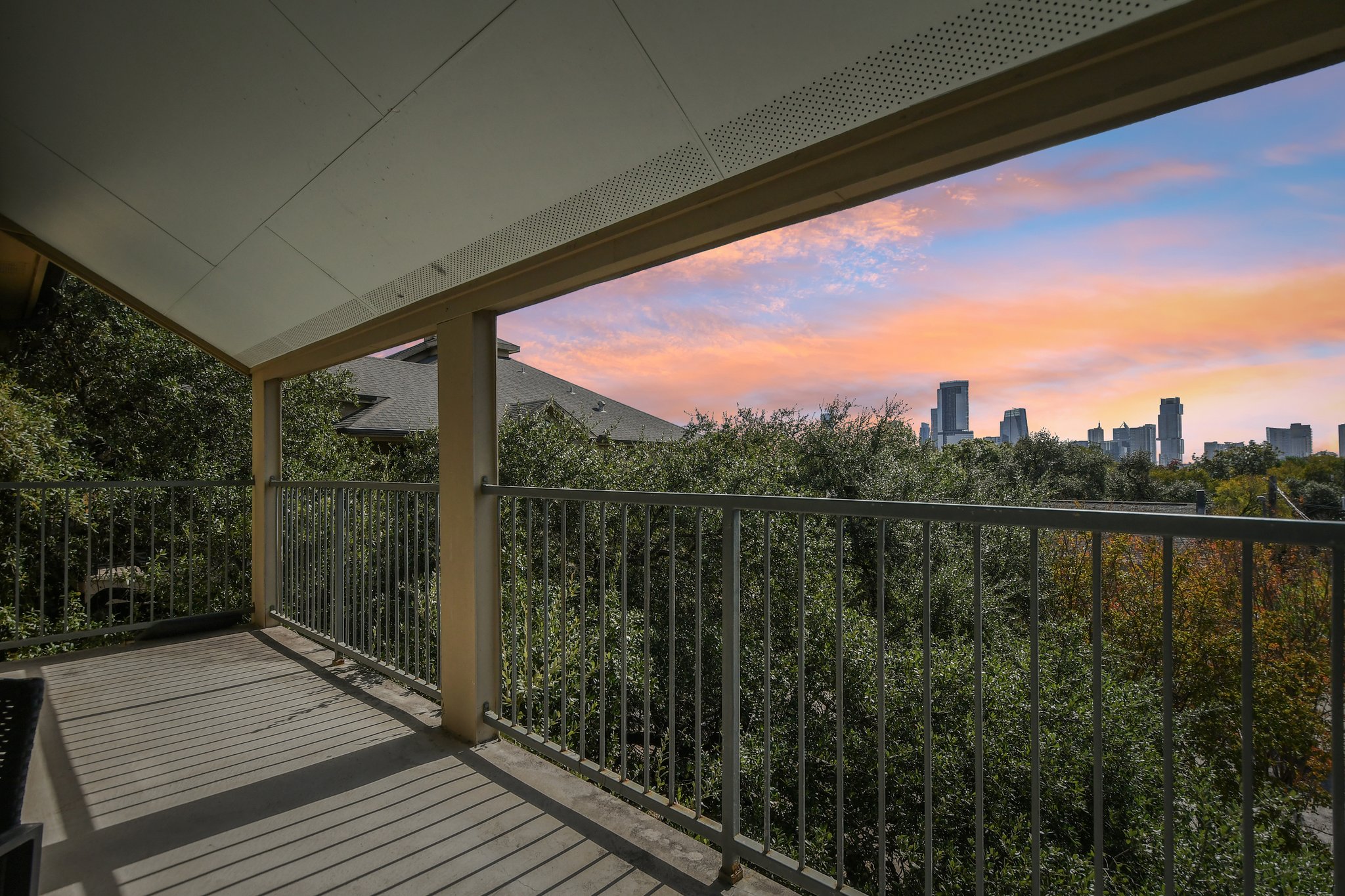 1910 Robbins Place, Unit 301 Austin, TX 78705 - Photo 1 of 29 a view of a balcony next to a lake view