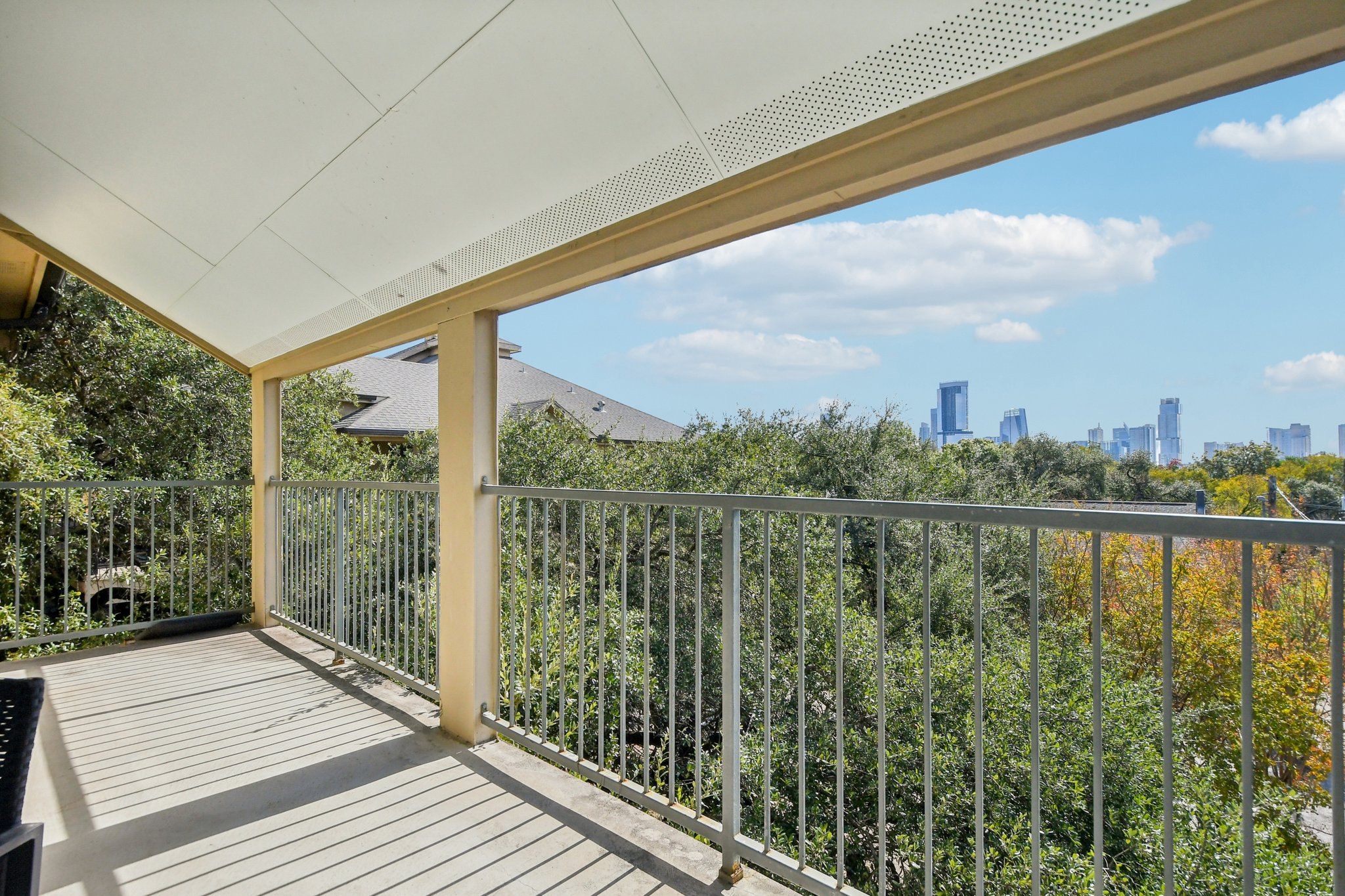 1910 Robbins Place, Unit 301 Austin, TX 78705 - Photo 22 of 29 a view of a balcony with lake view and mountain view