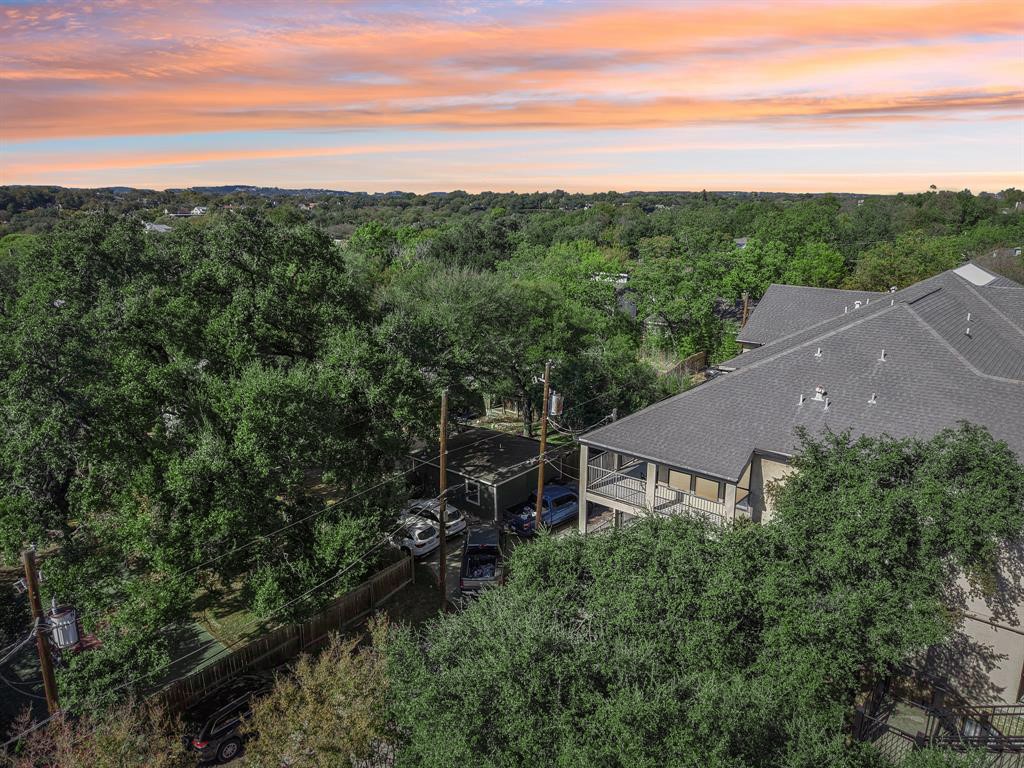 1910 Robbins Place, Unit 301 Austin, TX 78705 - Photo 3 of 29 a view of a house with a garden