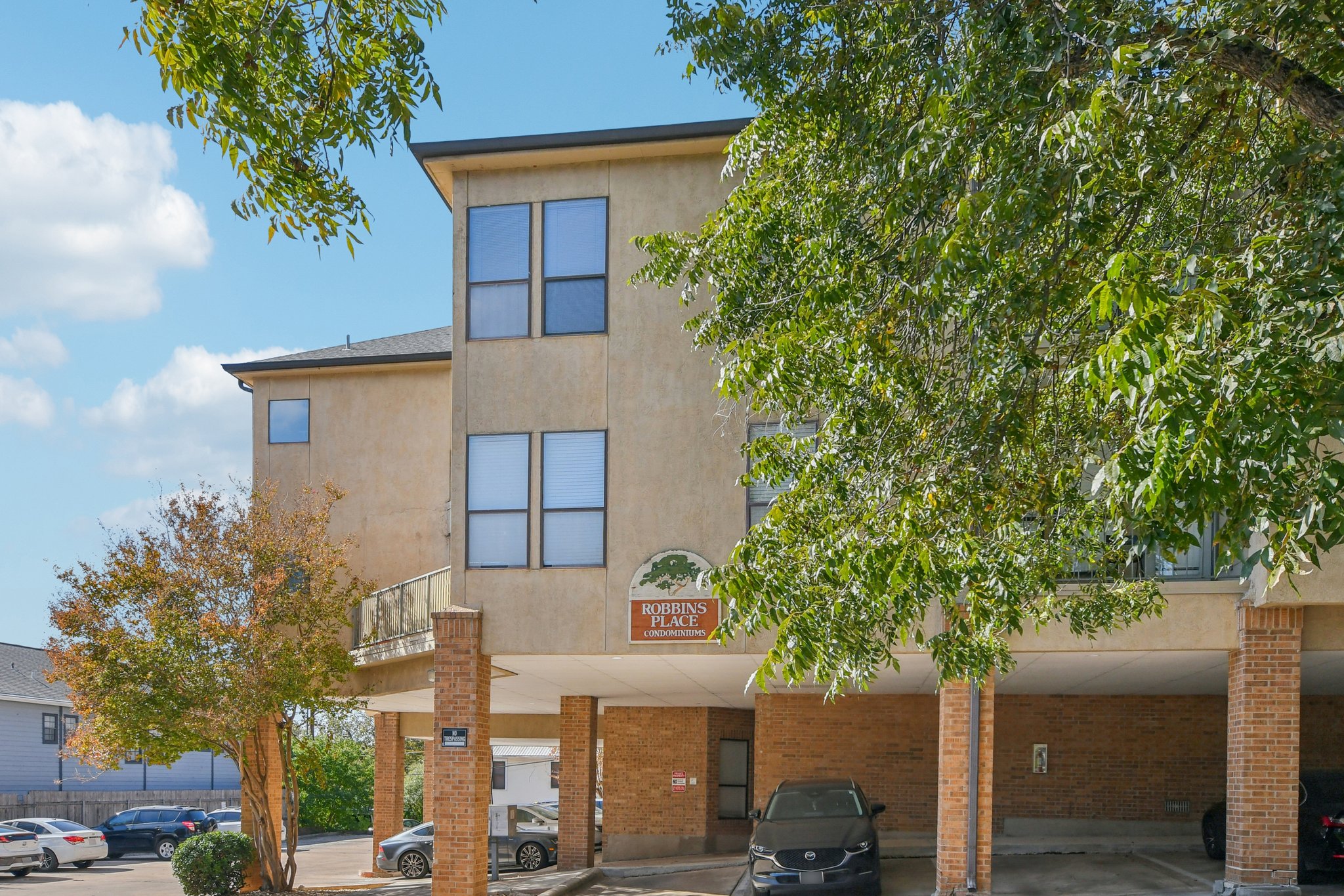 1910 Robbins Place, Unit 301 Austin, TX 78705 - Photo 9 of 29 a front view of a house with garden