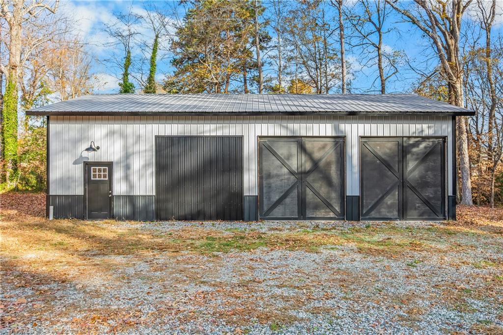 1815 Guilford College Road Jamestown, NC 27282 - Photo 44 of 49 48 x 24 Garage/Shop/Pole Barn