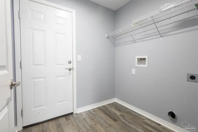 a view of room with window and hardwood floor