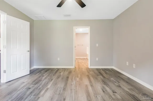 a bathroom with a sink a mirror and a shower
