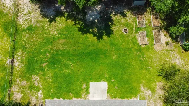 a backyard of a house with lots of green space