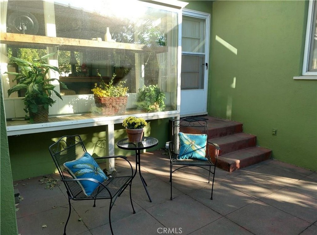 404 2nd Street Orland, CA 95963 - Photo 36 of 40 a view of a chairs and table in a patio