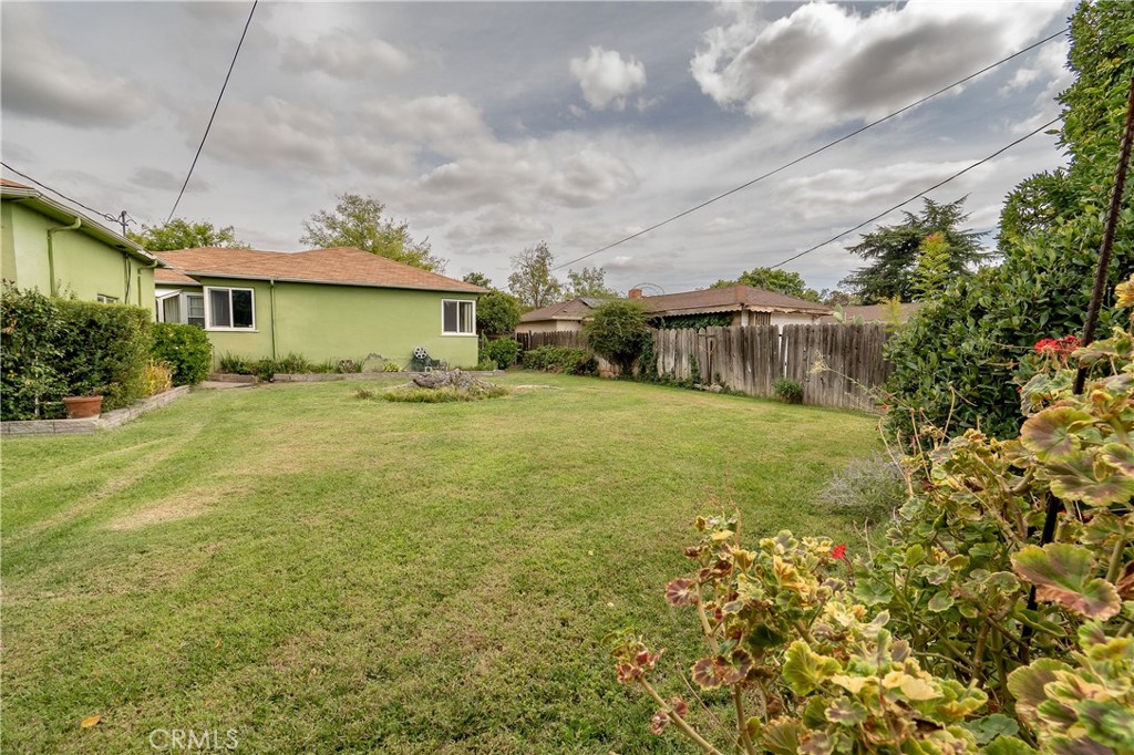 404 2nd Street Orland, CA 95963 - Photo 39 of 40 a view of a house with a yard and potted plants