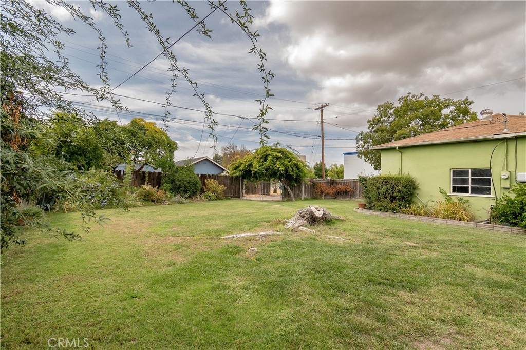 404 2nd Street Orland, CA 95963 - Photo 40 of 40 a backyard of a house with a yard and plants