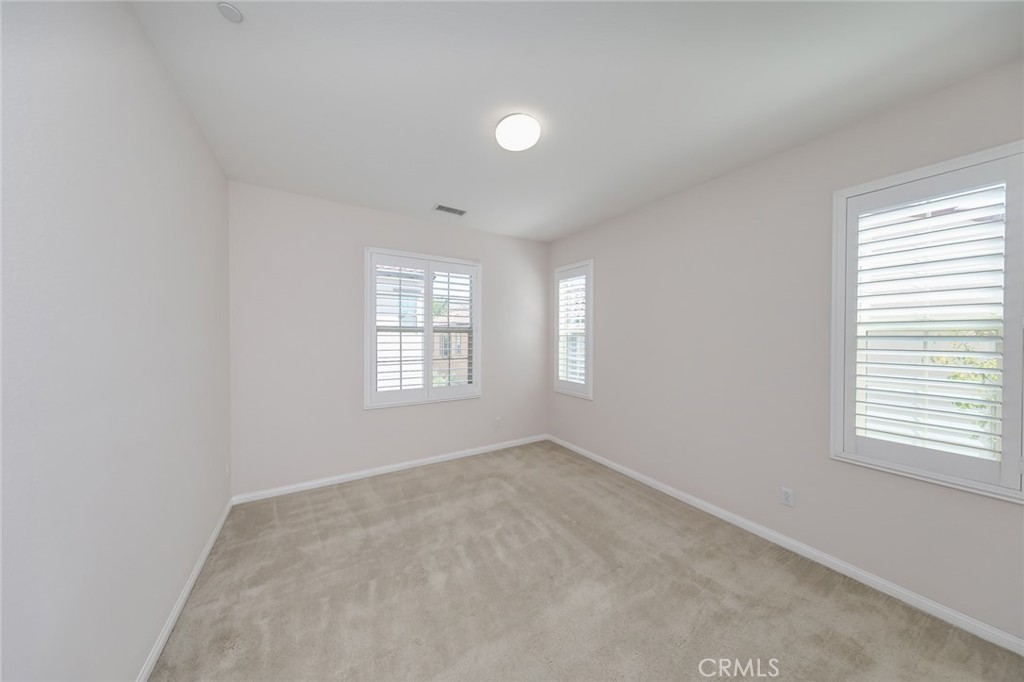 177 Firefly Irvine, CA 92618 - Photo 4 of 22 an empty room with windows