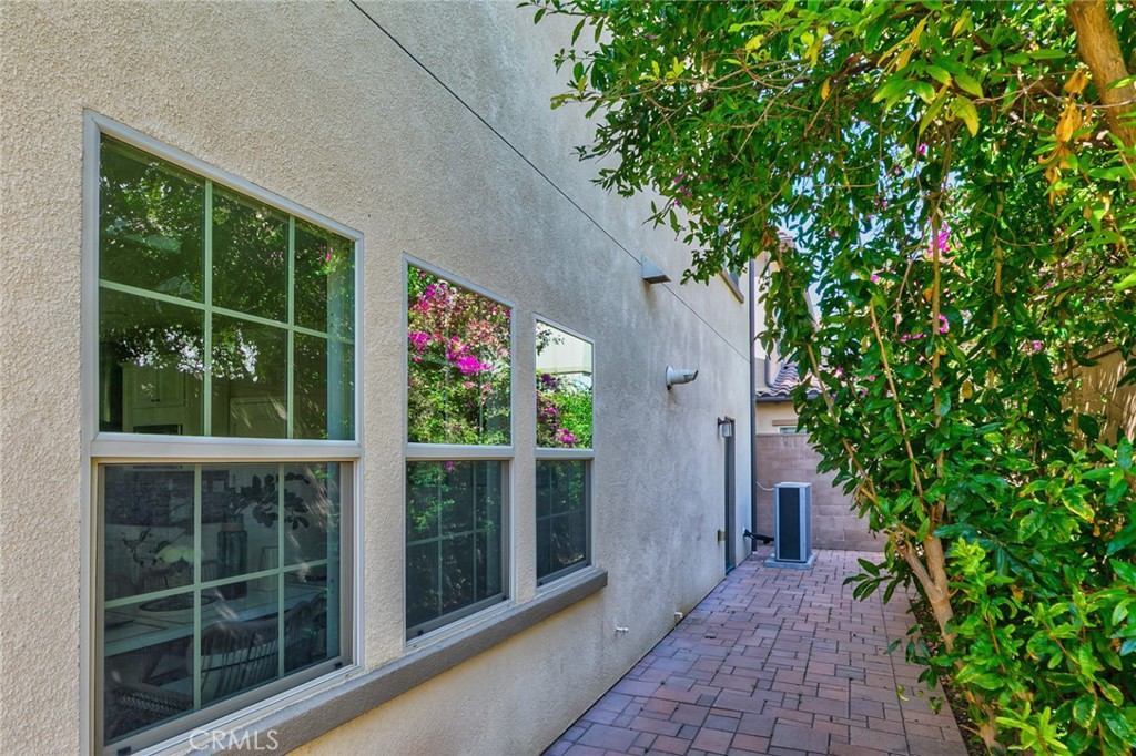 177 Firefly Irvine, CA 92618 - Photo 7 of 22 a house view with a garden space