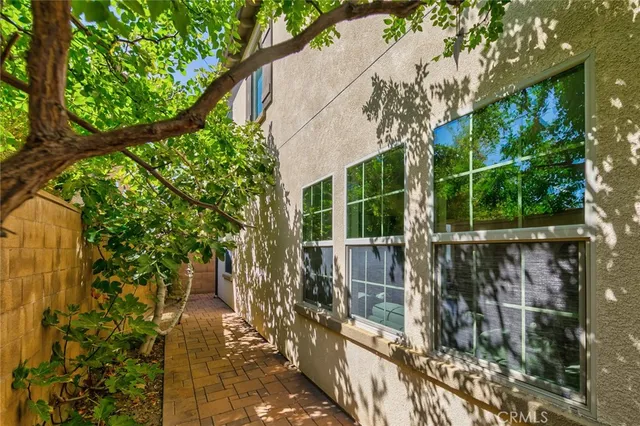 a house view with a garden space