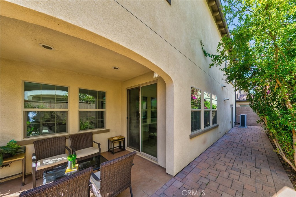 177 Firefly Irvine, CA 92618 - Photo 10 of 22 a view of a patio with chair and tables