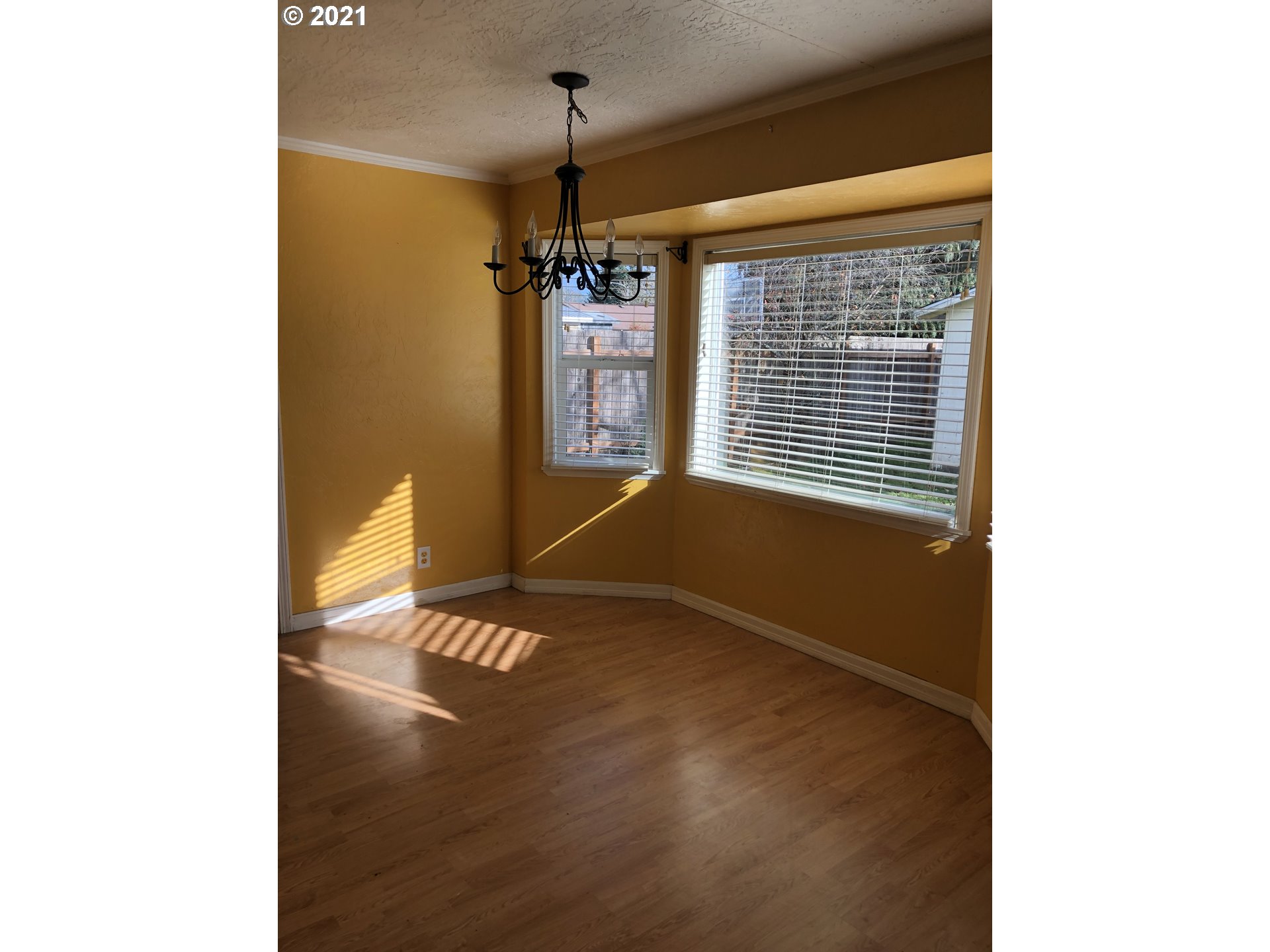 415 38th Street Springfield, OR 97478 - Photo 5 of 17 a view of an empty room with a window