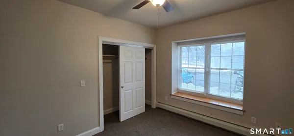 wooden floor and window in an empty room